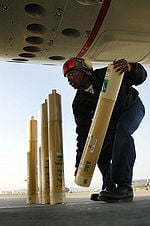 398px-Sonarbuoy loaded on aircraft.jpg