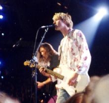 Kurt Cobain (right) with Nirvana, 1992.