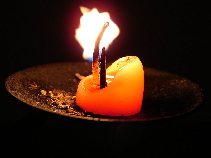 File:Candle stump on holder.jpg