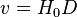 v = H_0 D \,