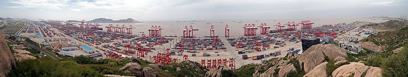 The Port of Shanghai's deep water harbor on Yangshan Island in the Hangzhou Bay is from 2010 the world's busiest container port.