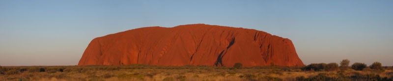 Ayers Rock, also known by its Aboriginal name of Uluru, stands almost 1000 feet high with a circumference of five miles.