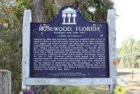 A color photograph of the back of the bronze plaque in Rosewood