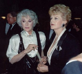 Two middle-aged white women standing next to each other