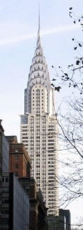 The Chrysler Building in Night New York City viewed from the Public Library.jpg