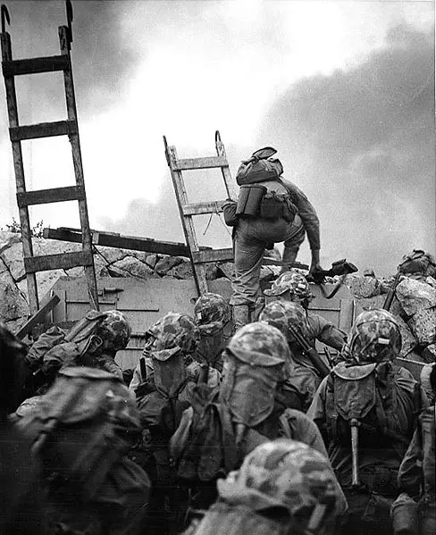 File:Lopez scaling seawall.jpg
