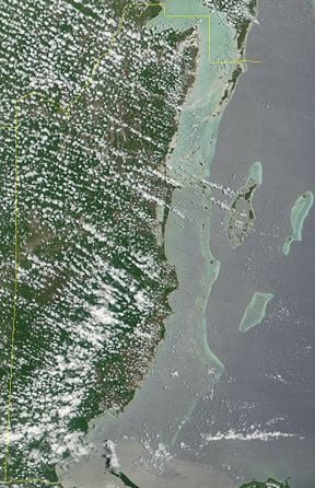 The Barrier Reef is clearly visible along the Belizean coast.