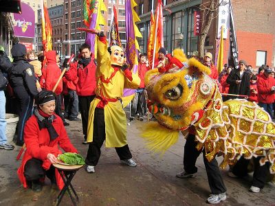 Entertainers perform lion dance during the opening ceremony of the