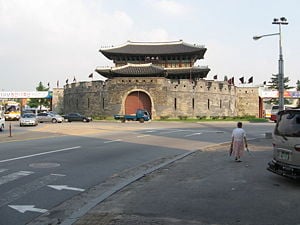 Janganmun, the north gate, is in the background and is the largest gate of the fortress. The semi-circular wall, Ongseong, is in front of the gate and was designed specifically to protect the gate.