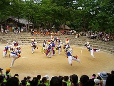 A performance of the farmers' dance at Korean Folk Village